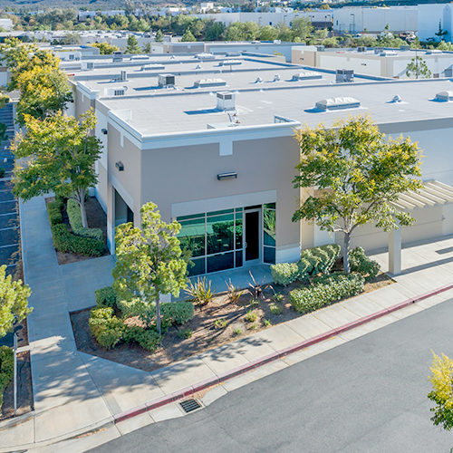 Commercial building with surrounding trees